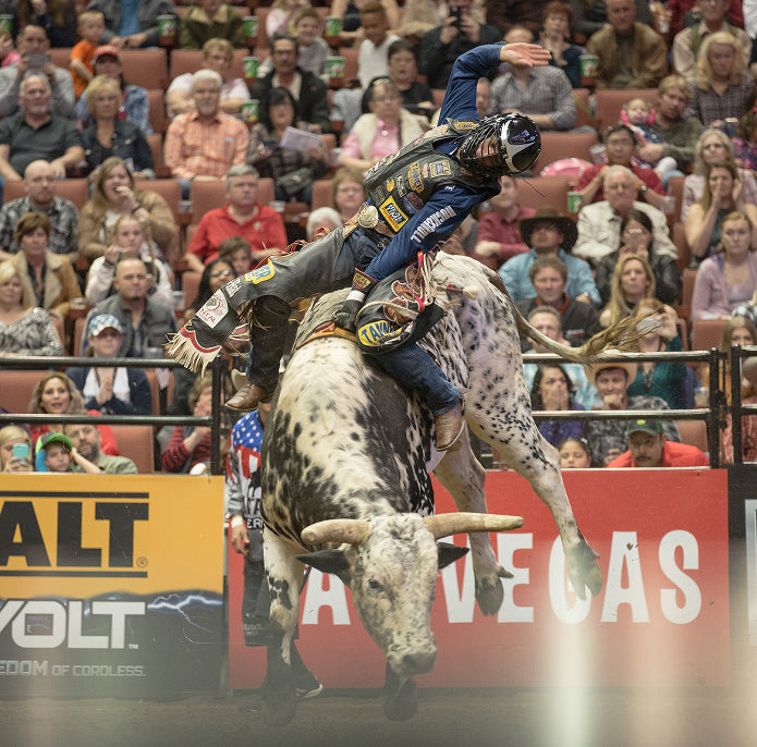 Man bull riding